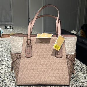 NWT Michael Kors “Voyager” laptop/tote; received as a gift from Dillards.